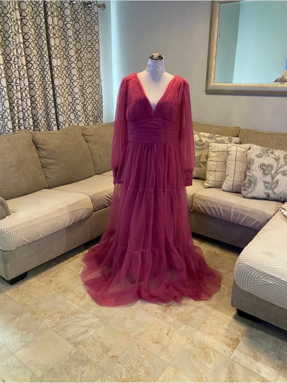 New Women 20 long-sleeve tiered maxi gown featuring a plunging V-neckline